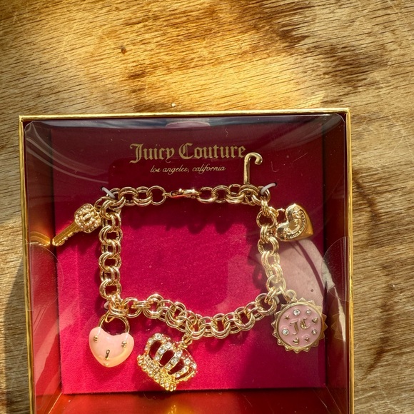 Juicy Couture Jewelry - Juicy Couture Gold Bracelet with Pink Charms